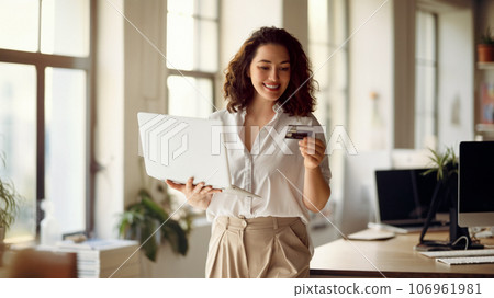Woman is doing online purchases 106961981