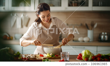 woman is preparing proper meal woman is preparing proper meal 106961985