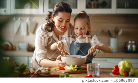 Happy family in the kitchen. Happy family in the kitchen. 106962097