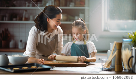 family are preparing bakery together family are preparing bakery together 106962098