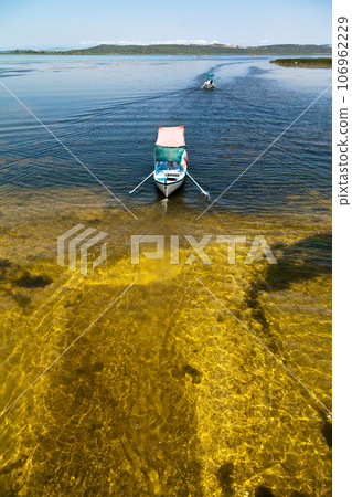 Touristic sightseeing boats around Ulubat or Uluabat Lake in Bursa, Turkey, June 25 2023 Touristic sightseeing boats around Ulubat or Uluabat Lake in Bursa, Turkey, June 25 2023 106962229