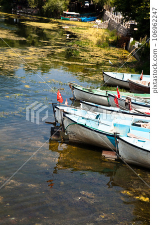 Fishing boats waiting by Ulubat or Uluabat Lake in Bursa, Turkey, June 25 2023 Fishing boats waiting by Ulubat or Uluabat Lake in Bursa, Turkey, June 25 2023 106962247