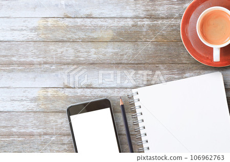 Flat lay wood office desk with office equipment Flat lay wood office desk with office equipment 106962763