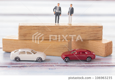 Businessman figures standing on the wood Businessman figures standing on the wood 106963235