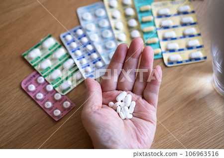 Elderly people taking medicine Elderly people taking medicine 106963516