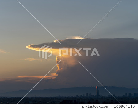 Huge cumulonimbus cloud and Osaka cityscape Huge cumulonimbus cloud and Osaka cityscape 106964119