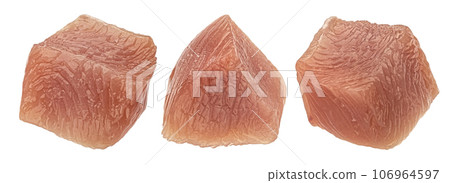 Raw turkey fillet cubes isolated on white background Raw turkey fillet cubes isolated on white background 106964597