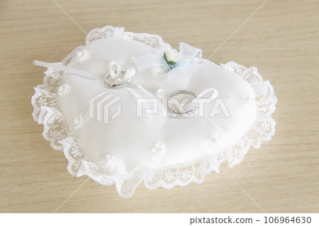 Wedding ring and ring pillow 106964630