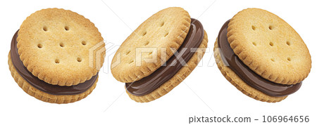 Sandwich cookies, chocolate cream filled biscuits isolated on white background, full depth of field 106964656