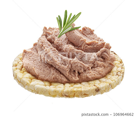 Liver pate on puffed rice cake isolated on white background, full depth of field 106964662