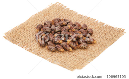 Castor oil with beans on sack 106965103