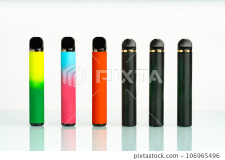 disposable electronic cigarettes on white background disposable electronic cigarettes on white background 106965496
