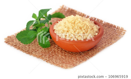 Sugar with stevia leaves 106965919