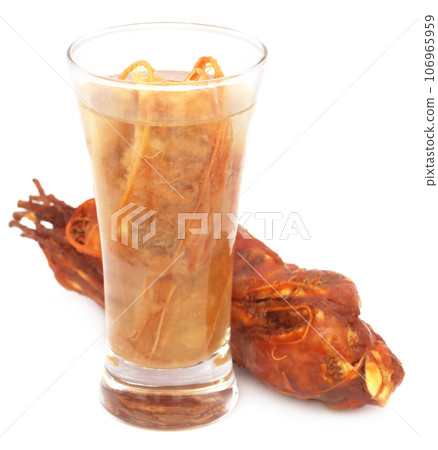 Tamarind juice in a glass 106965959