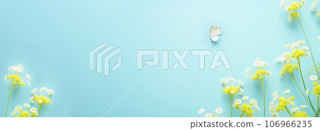Gently flowers and butterfly on light blue background. Banner of springtime composition. Greeting card for Wedding, mothers or womans day. Flat lay, copy space, top view. Gently flowers and butterfly on light blue background. Banner of springtime composition. Greeting card for Wedding, mothers or womans day. Flat lay, copy space, top view. 106966235