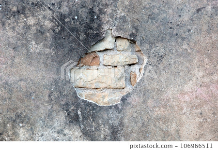 Maintenance needed on a plastered wall 106966511