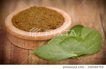 Ayurvedic henna leaves with paste 106966709