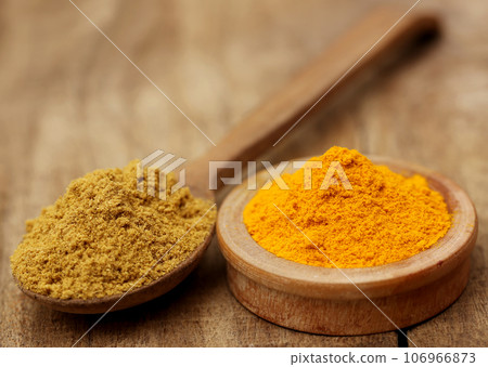 Ground turmeric and coriander Ground turmeric and coriander 106966873