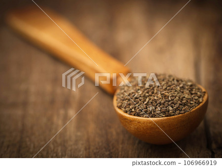 Ajwain seeds in a wooden spoon Ajwain seeds in a wooden spoon 106966919