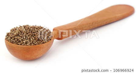 Ajwain seeds in a wooden spoon 106966924