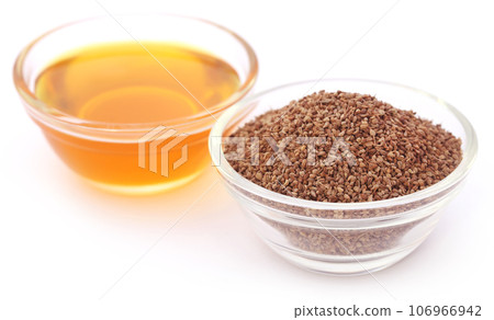 Ajwain seeds in a glass bowl with essential oil Ajwain seeds in a glass bowl with essential oil 106966942