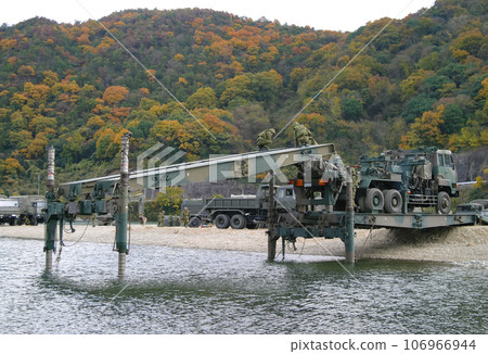 Ground Self-Defense Force working on bridge during river crossing training Ground Self-Defense Force working on bridge during river crossing training 106966944