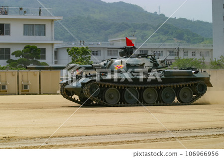 Ground Self-Defense Force's Type 74 tank assaulting at a training exhibition 106966956