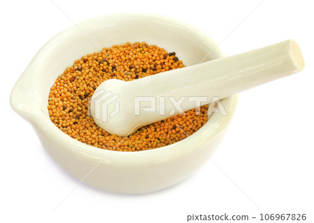 Mustard in a mortar with pestle Mustard in a mortar with pestle 106967826