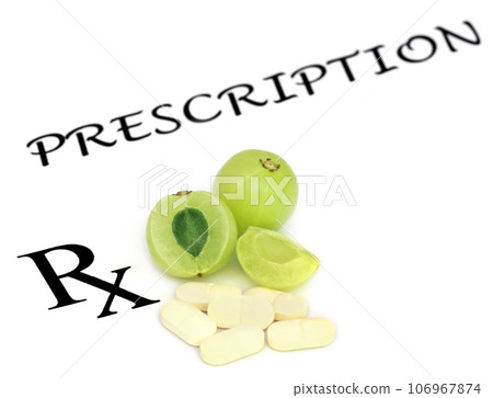 Amla fruits with pills Amla fruits with pills 106967874