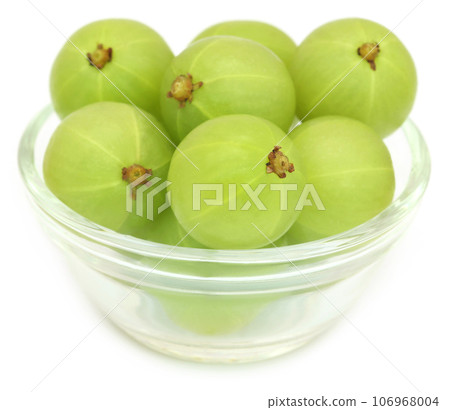 Amla fruits in a glass bowl Amla fruits in a glass bowl 106968004