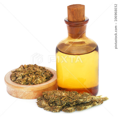 Medicinal cannabis with extract oil in a bottle Medicinal cannabis with extract oil in a bottle 106968032