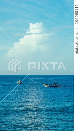 Sea sky cumulus cloud landscape view background. Calm water alone fishing boat. Destination aim progress concept Sea sky cumulus cloud landscape view background. Calm water alone fishing boat. Destination aim progress concept 106968115