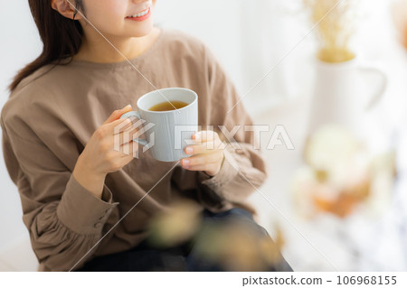 Woman in brown blouse 106968155