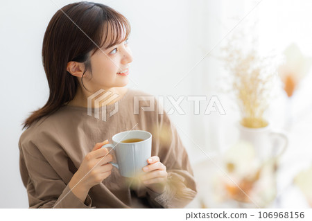 Woman in brown blouse 106968156
