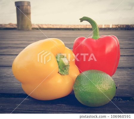 Two capsicums with lemon 106968591