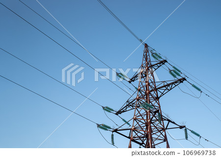 Power line support with wires for electricity transmission. High voltage grid tower with wire cable. 106969738