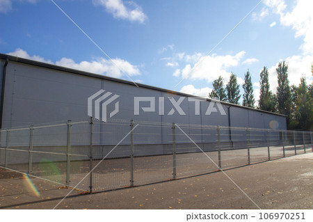 Modern big industrial warehouse building Modern big industrial warehouse building 106970251