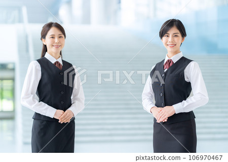 A young receptionist guiding you in the lobby A young receptionist guiding you in the lobby 106970467