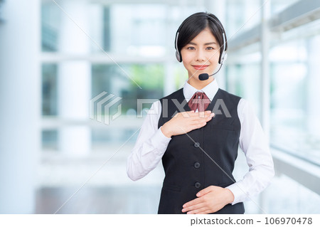 Young female operator working at a call center Young female operator working at a call center 106970478