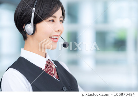 Young female operator working at a call center Young female operator working at a call center 106970484