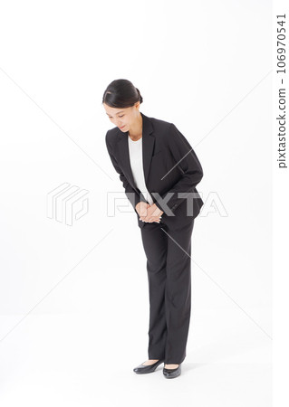 Career woman bowing Career woman bowing 106970541