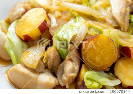 A close-up of Kogma Dakgalbi (Sweet Potato Dakgalbi). A close-up of Kogma Dakgalbi (Sweet Potato Dakgalbi). 106970544