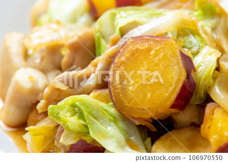 A close-up of Kogma Dakgalbi (Sweet Potato Dakgalbi). A close-up of Kogma Dakgalbi (Sweet Potato Dakgalbi). 106970550