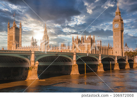 Big Ben, Westminster Bridge on River Thames in London, the UK. English symbol. Lovely puffy clouds, sunny day Big Ben, Westminster Bridge on River Thames in London, the UK. English symbol. Lovely puffy clouds, sunny day 106972008