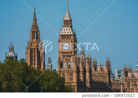 Big Ben, Westminster Bridge on River Thames in London, the UK. English symbol. Lovely puffy clouds, sunny day Big Ben, Westminster Bridge on River Thames in London, the UK. English symbol. Lovely puffy clouds, sunny day 106972022