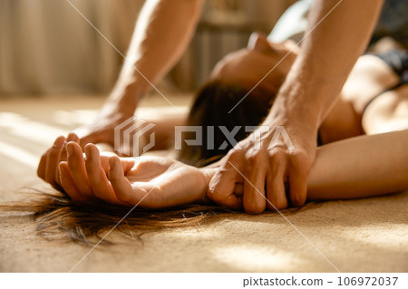 Passionate heterosexual lovers on floor, romantic date and sensuality 106972037