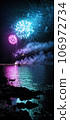 Fireworks explosion on the seaside. Blue and lilac colours, reflection on water. Night festival celebration. Vertical size black color backdrop 106972734