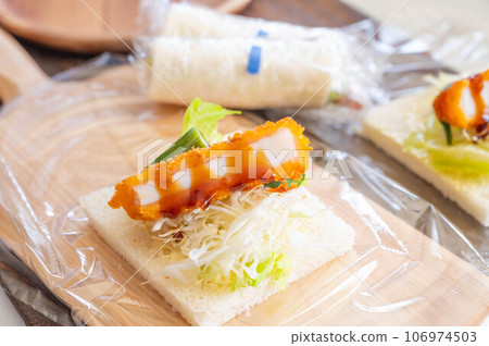 Making rolls and fried squid Making rolls and fried squid 106974503