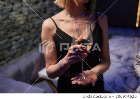 Clinking glasses with alcohol and toasting, party. Clinking glasses with alcohol and toasting, party. 106974626