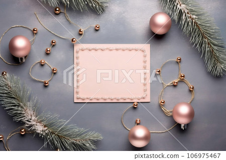 Mockup blank greeting card, space for text with pink rose gold baubles and fir branch on gray background, top view, Chirstmas background. Generative AI 106975467